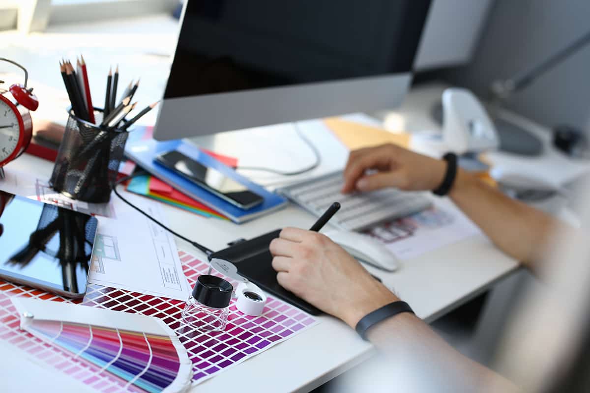 Designer sitting at desk