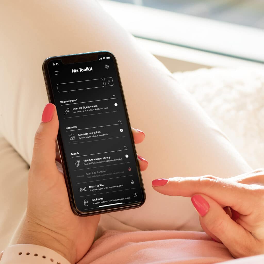 Woman using mobile phone with empty white screen